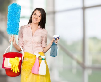 London office cleaners vacuuming and polishing a corporate workspace