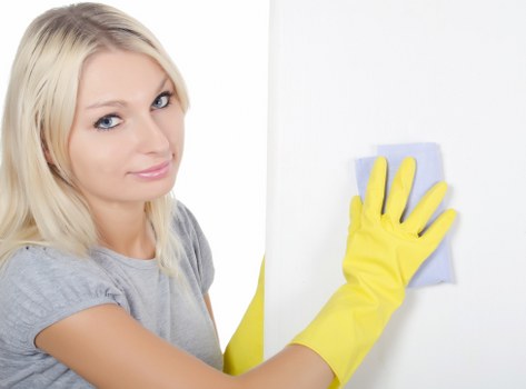End of tenancy cleaning checklist and cleaning supplies in a home
